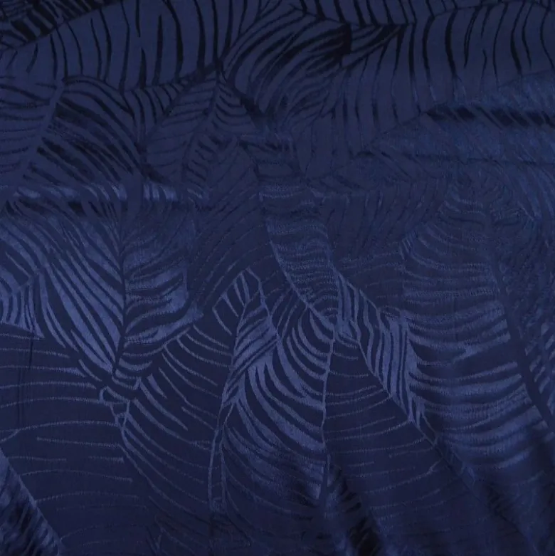 Tissu satin de viscose motif exotique fond bleu marine