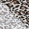 Tissu satin de viscose motif Léopard fond blanc cassé