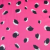 Tissu Satin de viscose motif leopard fond fuchsia