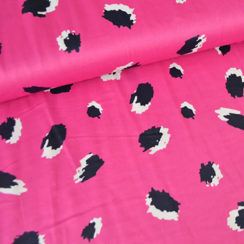 Tissu Satin de viscose motif leopard fond fuchsia