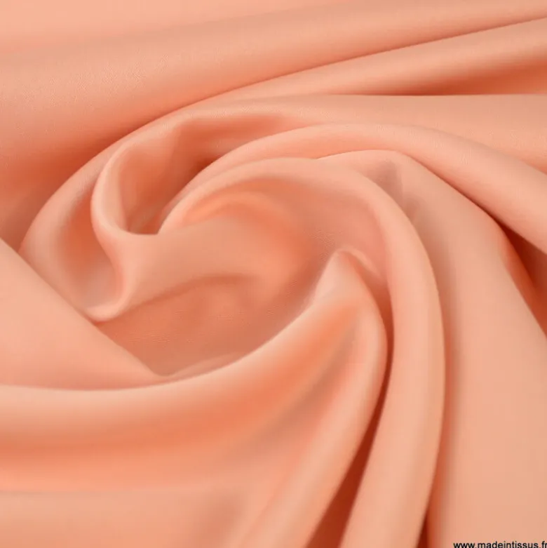 Tissu satin microfibre fluide uni Corail.