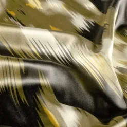 Tissu Satin motif style Ikat - Noir et vert