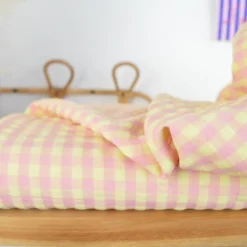 Tissu seersucker Vichy grands carreaux rose et jaune pâle