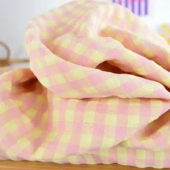 Tissu seersucker Vichy grands carreaux rose et jaune pâle