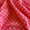 Tissu seersucker Vichy grands carreaux rose fluo