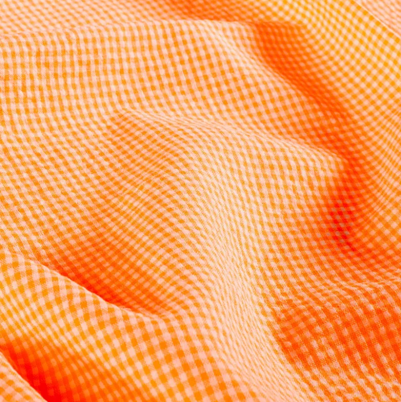 Tissu seersucker Vichy petits carreaux orange fluo