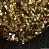 Tissu Sequin doré sur velours noir