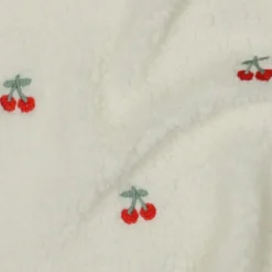 Tissu Sherpa brodée motif cerises fond écru