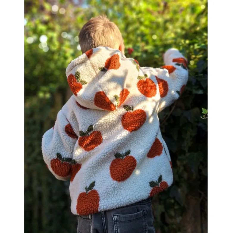 Tissu Sherpa motif pommes orangées fond écru