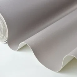 Tissu Simili cuir ameublement rigide gris pierre
