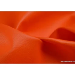 Tissu Simili cuir ameublement rigide orange