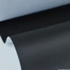 Tissu simili cuir carbon noir pour sellerie automobile.