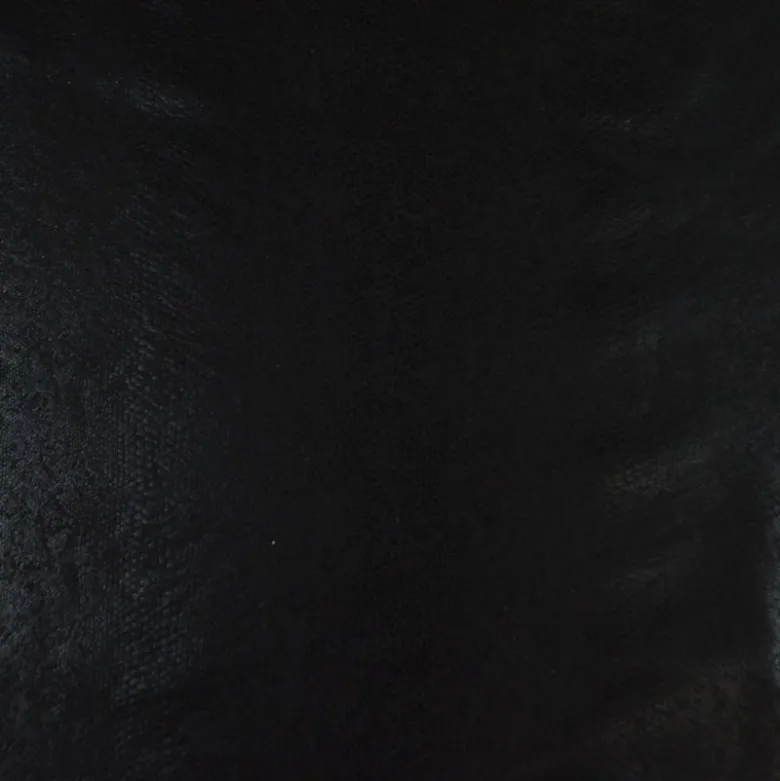 Tissu simili cuir extensible aspect peu de serpent noir