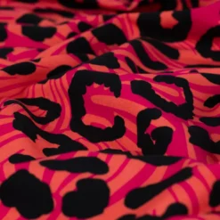 Tissu Sweat French Terry léopard fond Saumon