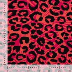 Tissu Sweat French Terry léopard fond Saumon