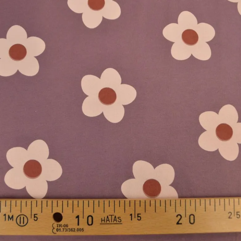 Tissu Sweat French terry motif fleurs fond parme - OEKO TEX