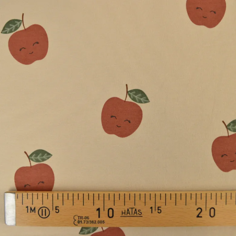 Tissu Sweat French terry motif pommes fond beige - OEKO TEX