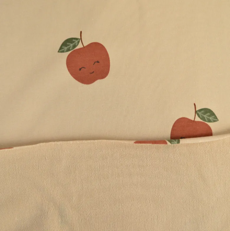 Tissu Sweat French terry motif pommes fond beige - OEKO TEX