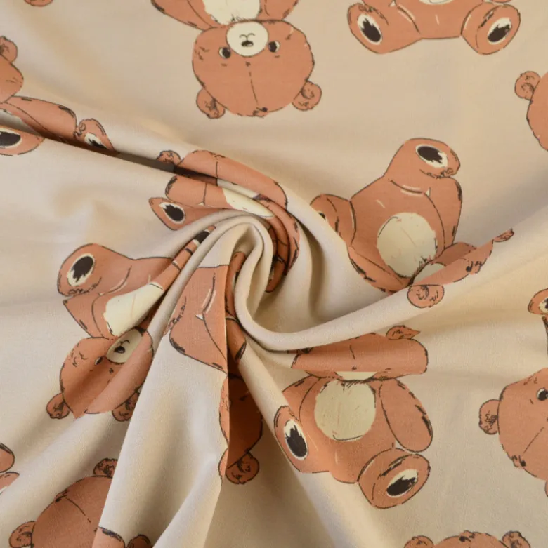 Tissu Sweat French terry motif ours fond beige - OEKO TEX