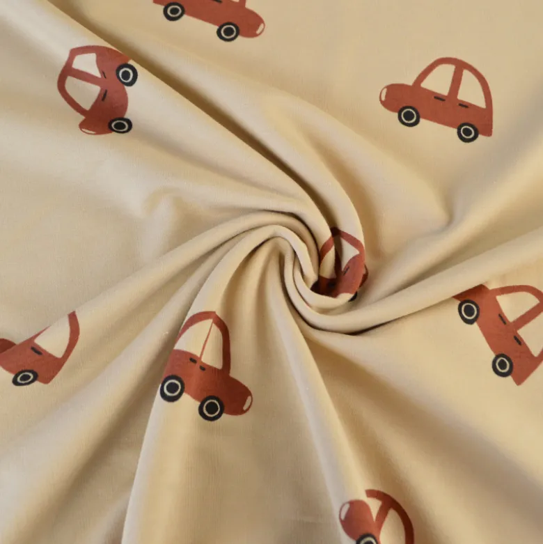 Tissu Sweat French terry motif voitures fond beige - OEKO TEX