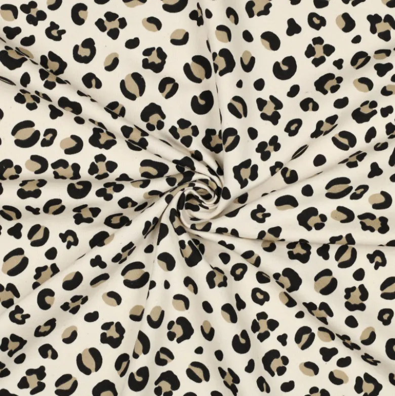 Tissu Sweat molleton motifs Léopard fond milk - Poppy