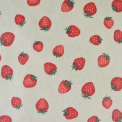 Tissu toile enduite aspect lin motif fraises