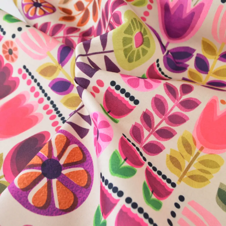 Tissu toile enduite graphique fleurie