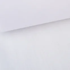 Tissu Tulle raide coloris BLANC 100% polyamide 300cm 27gr/m² .