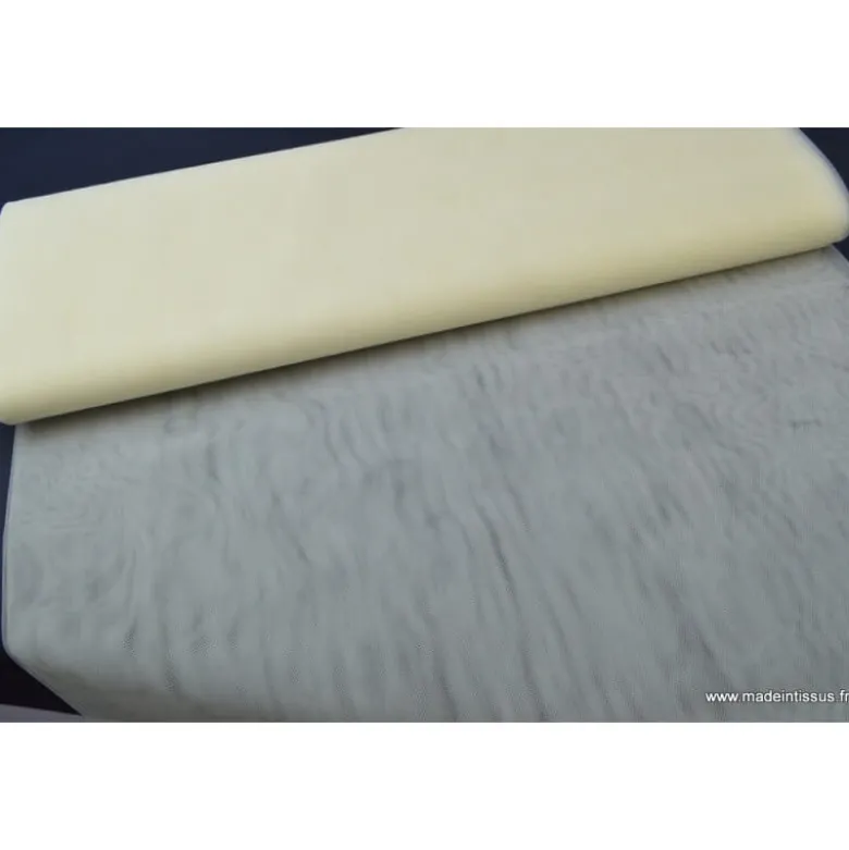 Tissu Tulle raide coloris ivoire 100% polyamide 300cm 27gr/m² .