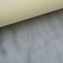 Tissu Tulle raide coloris ivoire 100% polyamide 300cm 27gr/m² .