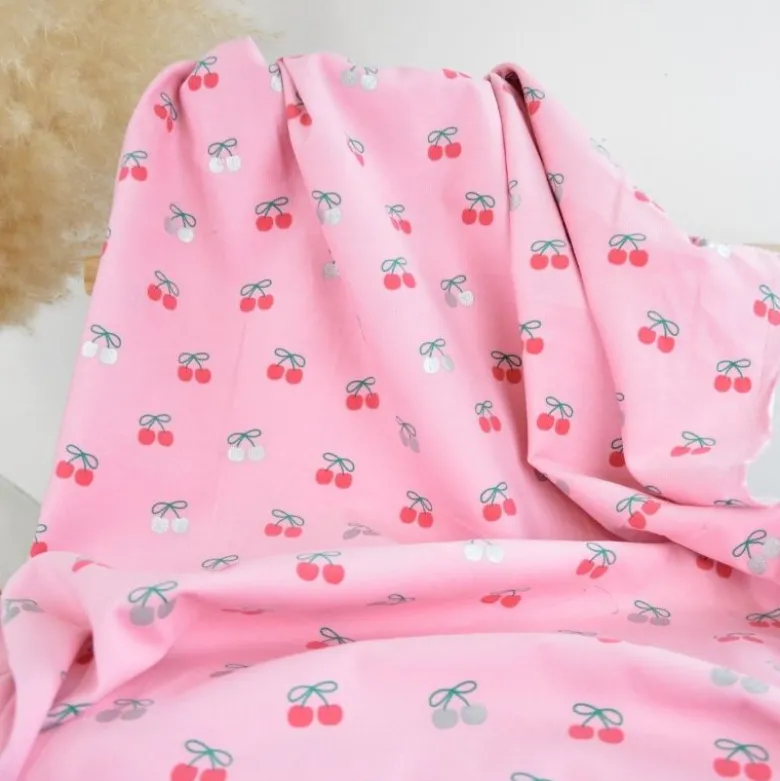 Tissu velours milleraies Poppy motif cerises foil fond rose - OEKO TEX