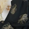 Tissu viscose lin motif fleurs sables fond noir