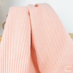 Tissu viscose mélangée à rayures tangerine et blanches