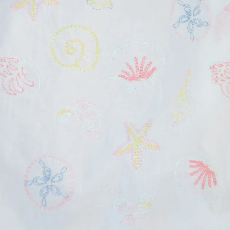 Tissu voile de coton brodé Coquillages fond blanc