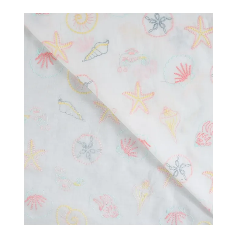 Tissu voile de coton brodé Coquillages fond blanc