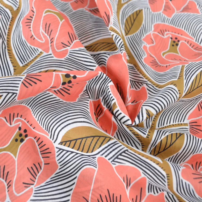 Tissu voile de coton motif fleurs corail et ocre fond rayé