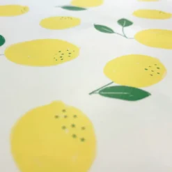 Toile cirée motif citrons fond blanc cassé