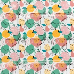 Toile cirée motif fruits fond blanc cassé