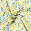 Toile cirée motif poires jaunes fond blanc cassé