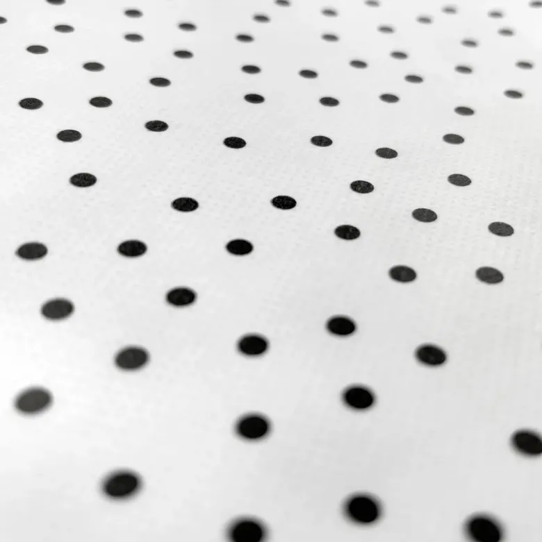 Toile cirée motif pois noirs fond blanc