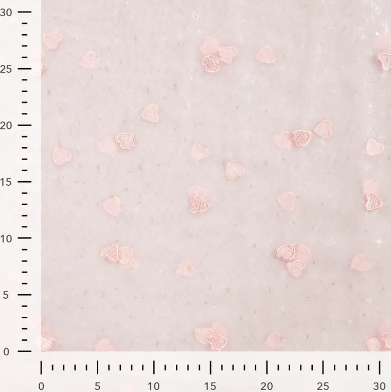 Tulle brodé rose brodé de coeurs roses