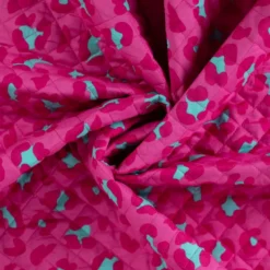 Voile de coton matelassée Ravika motif léopard fond rose fuchsia
