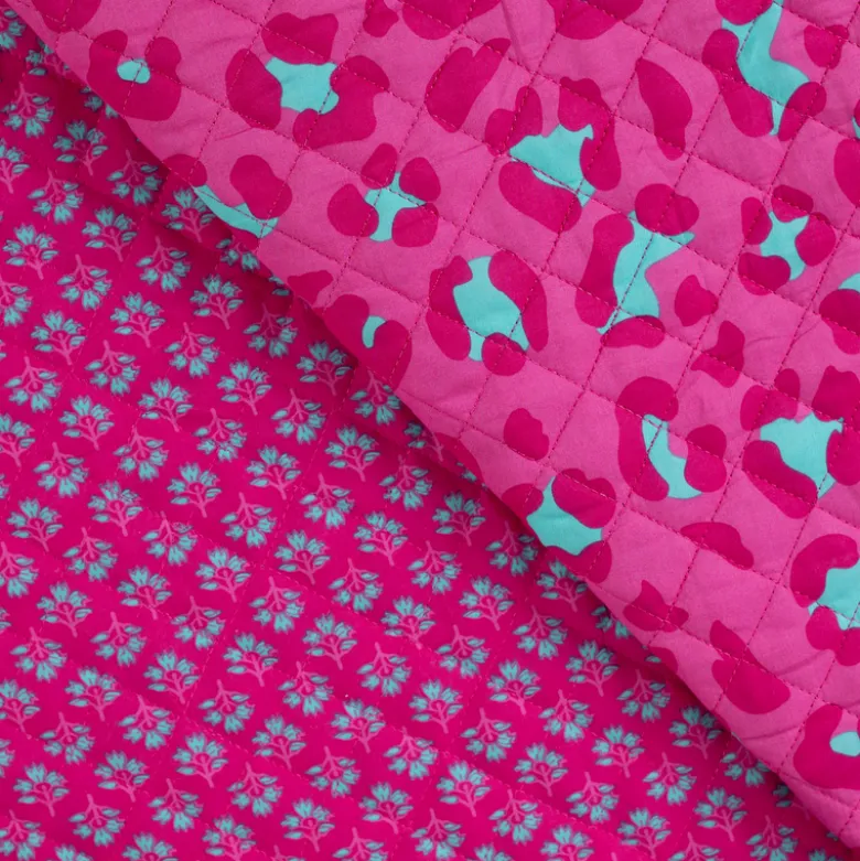 Voile de coton matelassée Ravika motif léopard fond rose fuchsia