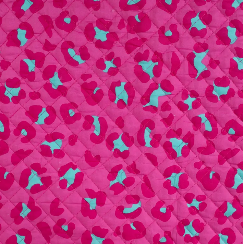 Voile de coton matelassée Ravika motif léopard fond rose fuchsia