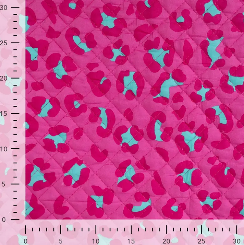 Voile de coton matelassée Ravika motif léopard fond rose fuchsia