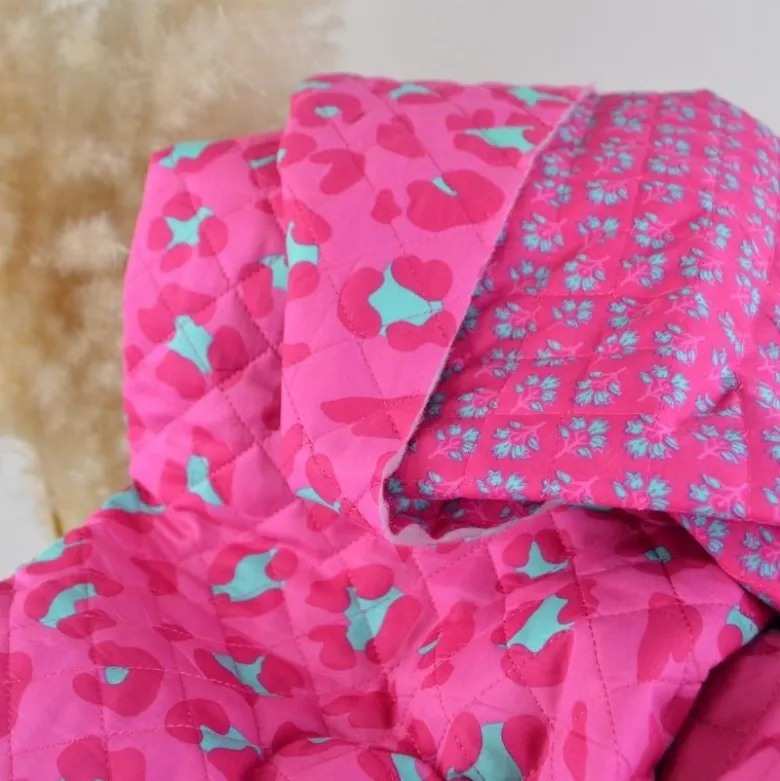 Voile de coton matelassée Ravika motif léopard fond rose fuchsia