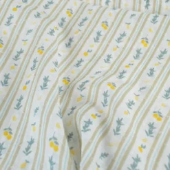Voile plumetis rayures et citrons fond écru