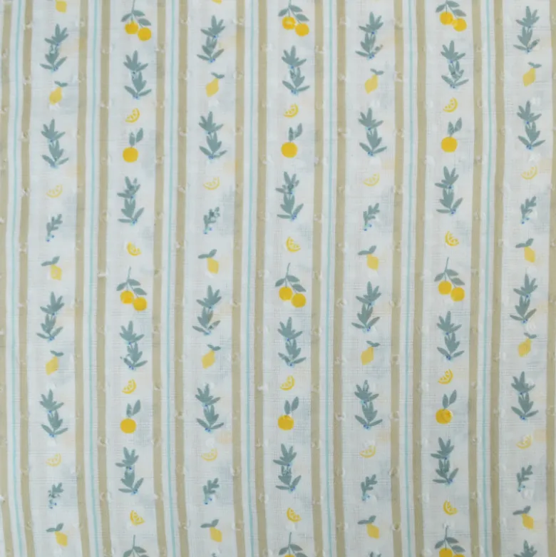 Voile plumetis rayures et citrons fond écru