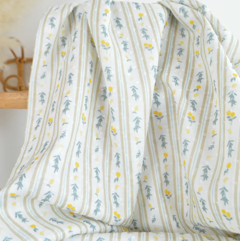 Voile plumetis rayures et citrons fond écru